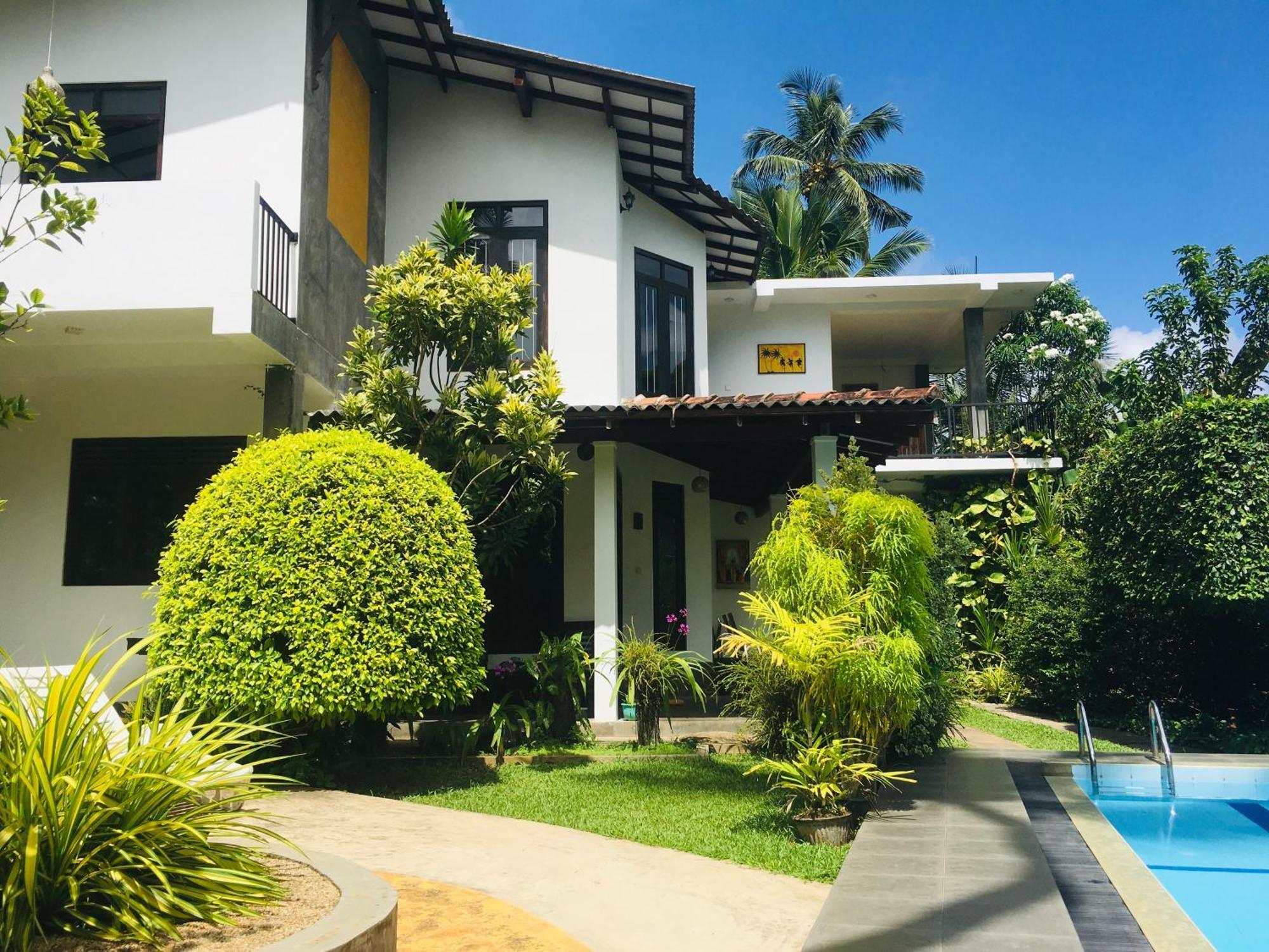 Om Villa Hikkaduwa Exterior photo